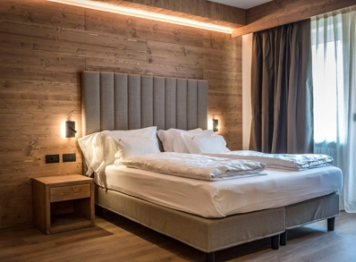 Come illuminare le camere di un hotel: Sporthotel Arabba